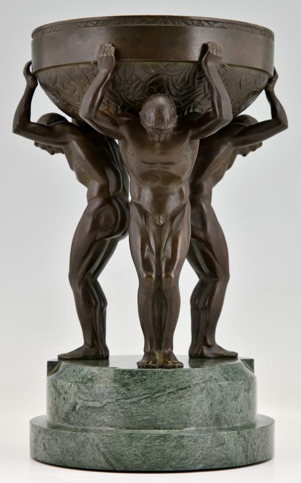 Art Deco bronze sculpture centerpiece with three men.