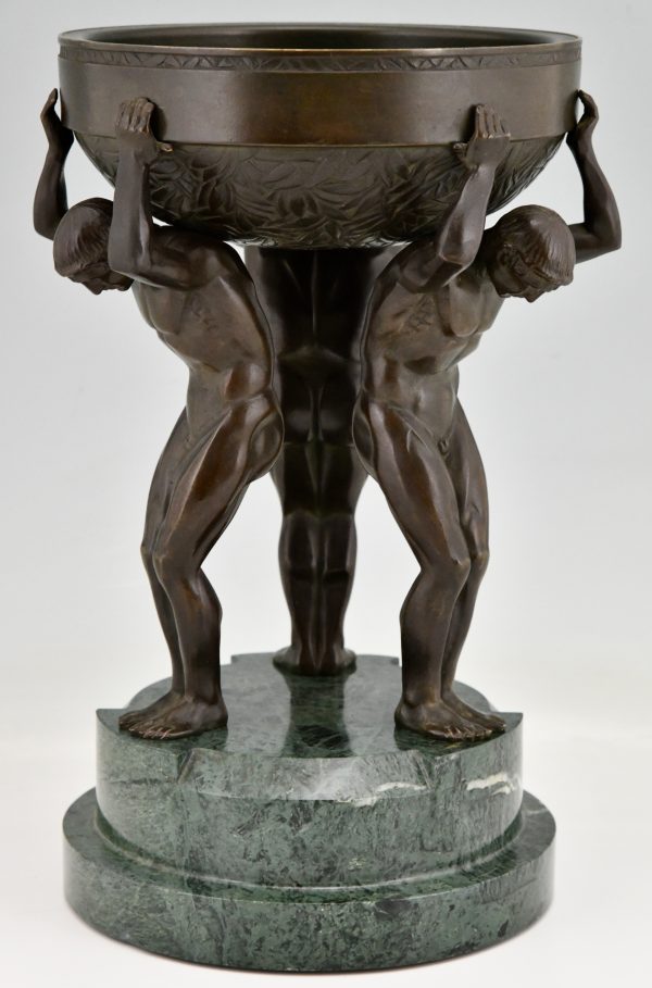 Art Deco bronze sculpture centerpiece with three men.