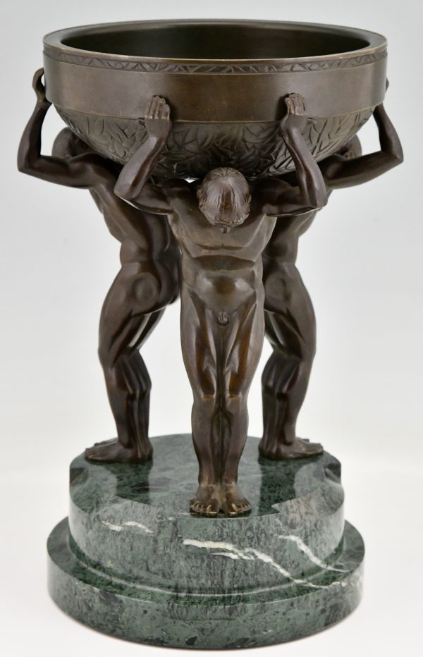 Art Deco bronze sculpture centerpiece with three men.