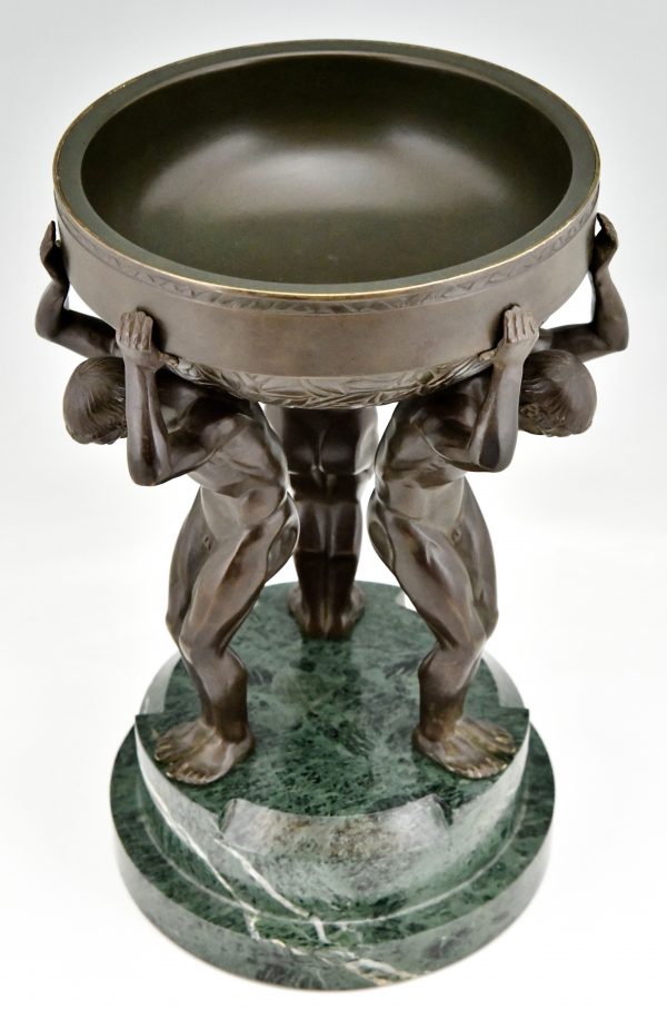 Art Deco bronze sculpture centerpiece with three men.