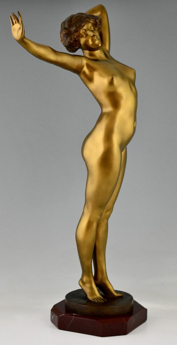 Reveil Art Déco sculpture en bronze d’une femme nue 80 cm.