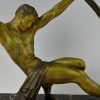 Art Deco sculpture athletic man bending a bar L’age du bronze