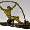 Art Deco sculpture athletic man bending a bar L’age du bronze