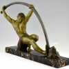 Art Deco sculpture athletic man bending a bar L’age du bronze