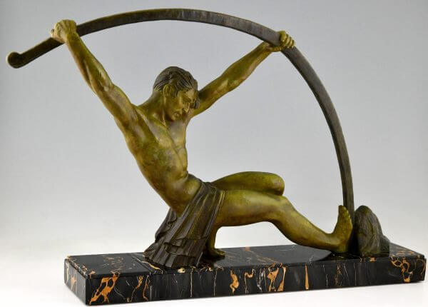 Art Deco sculpture athletic man bending a bar L’age du bronze