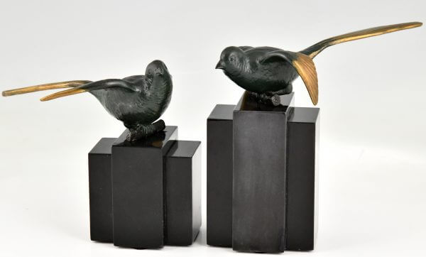 Art Deco bronzen vogel boekensteunen kwikstaarten