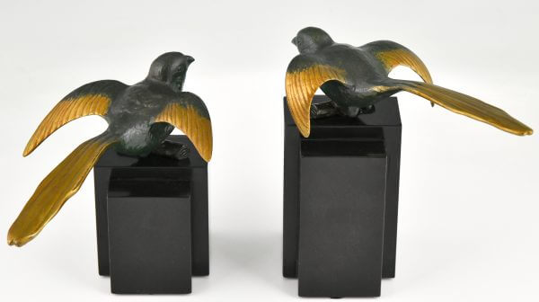 Art Deco bronzen vogel boekensteunen kwikstaarten