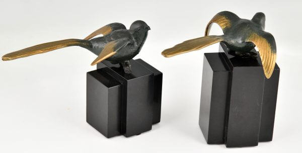 Art Deco bronzen vogel boekensteunen kwikstaarten