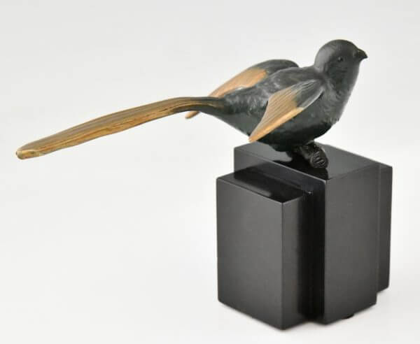 Art Deco bronzen vogel boekensteunen kwikstaarten