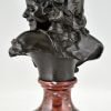 Antique bronze bust of a smiling child.