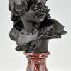 Antique bronze bust of a smiling child.