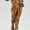Art Deco bronzen sculptuur rokende vrouw in pyjama.