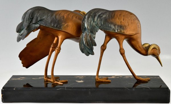 Art Deco bronzen sculptuur van twee kraanvogels