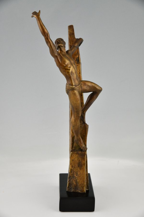 Art Deco bronze sculpture athletic man on a rock