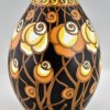 Art Deco ceramic vase with stylized flowers