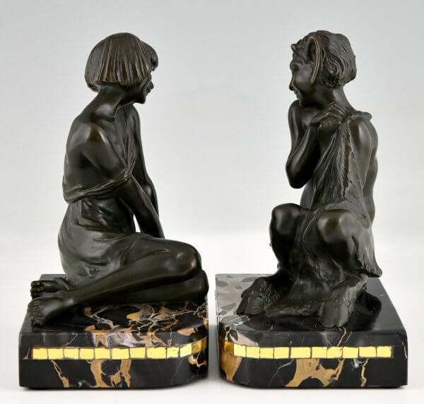 Art Deco bronzen boekensteunen sater faun en nimf