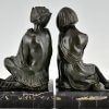 Art Deco bronzen boekensteunen sater faun en nimf