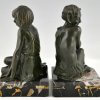 Art Deco bronzen boekensteunen sater faun en nimf