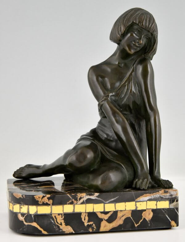 Art Deco bronzen boekensteunen sater faun en nimf