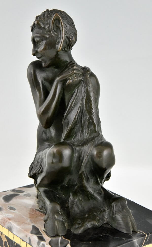 Art Deco bronzen boekensteunen sater faun en nimf