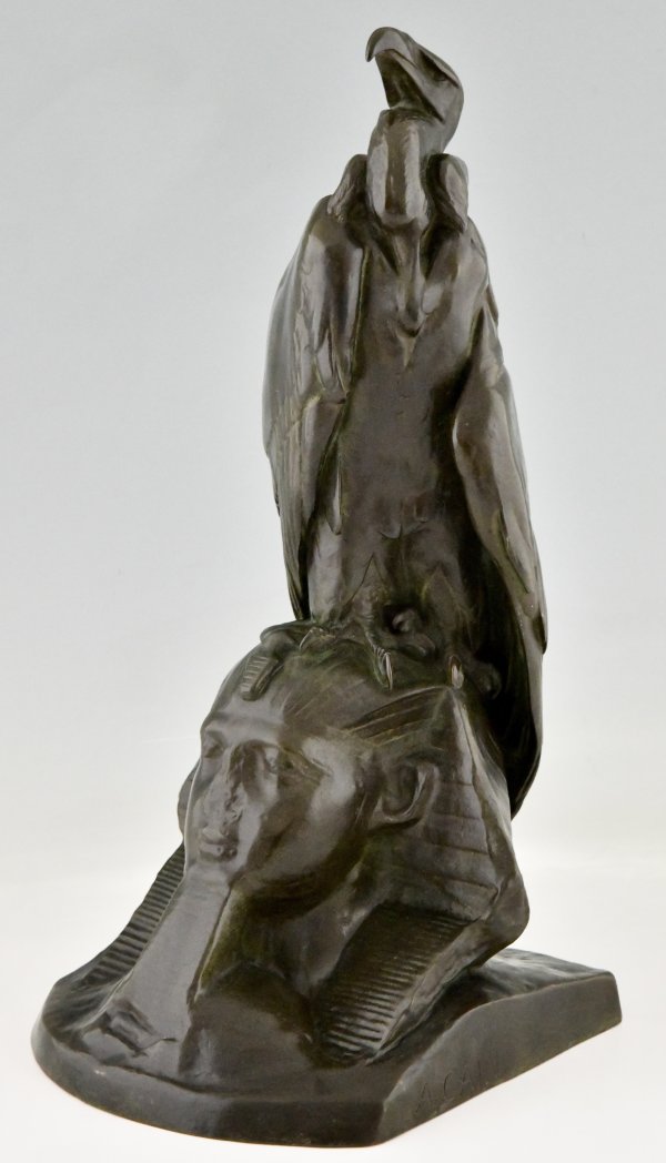 Antique bronze sculpture of a vulture on a sphinx