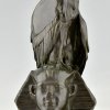 Antique bronze sculpture of a vulture on a sphinx