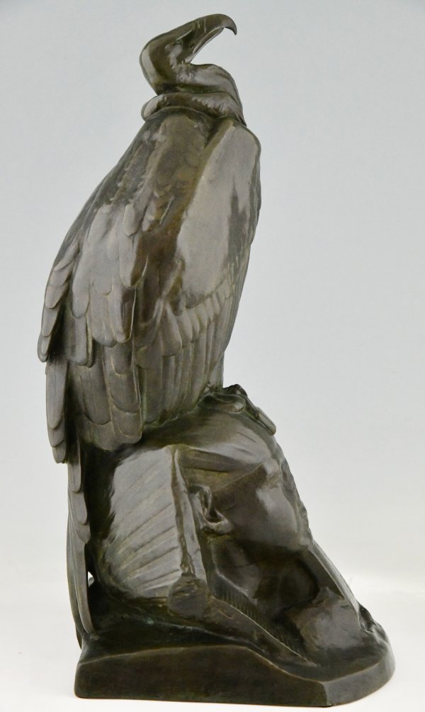 Antique bronze sculpture of a vulture on a sphinx