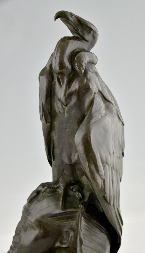 Antique bronze sculpture of a vulture on a sphinx