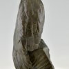 Antique bronze sculpture of a vulture on a sphinx