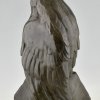 Antique bronze sculpture of a vulture on a sphinx