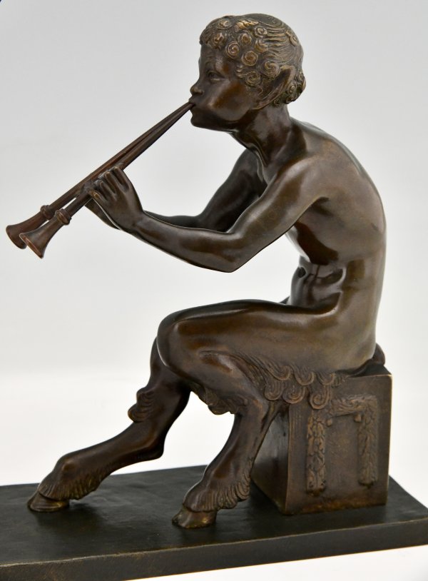 Art Deco bronze sculpture of a Thyrse dancer with faun