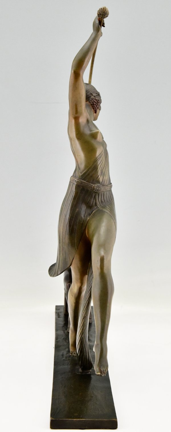 Art Deco bronze sculpture of a Thyrse dancer with faun