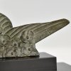 Art Deco sculpture birds in flight.