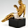 Art Deco bronze sculpture seated nude with flowers.