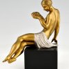 Art Deco bronze sculpture seated nude with flowers.