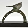 Art Deco bronzen sculptuur vogel op hoefijzer