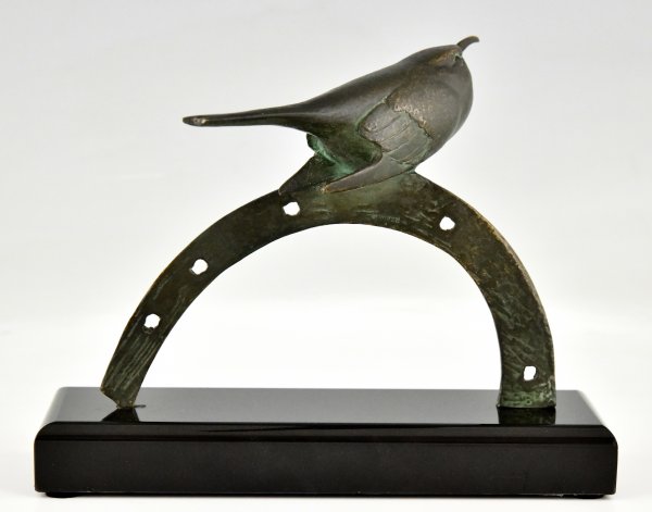 Art Deco bronze sculpture bird on horseshoe