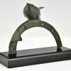 Art Deco bronze sculpture bird on horseshoe