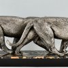 Art Deco sculpture of two panthers.