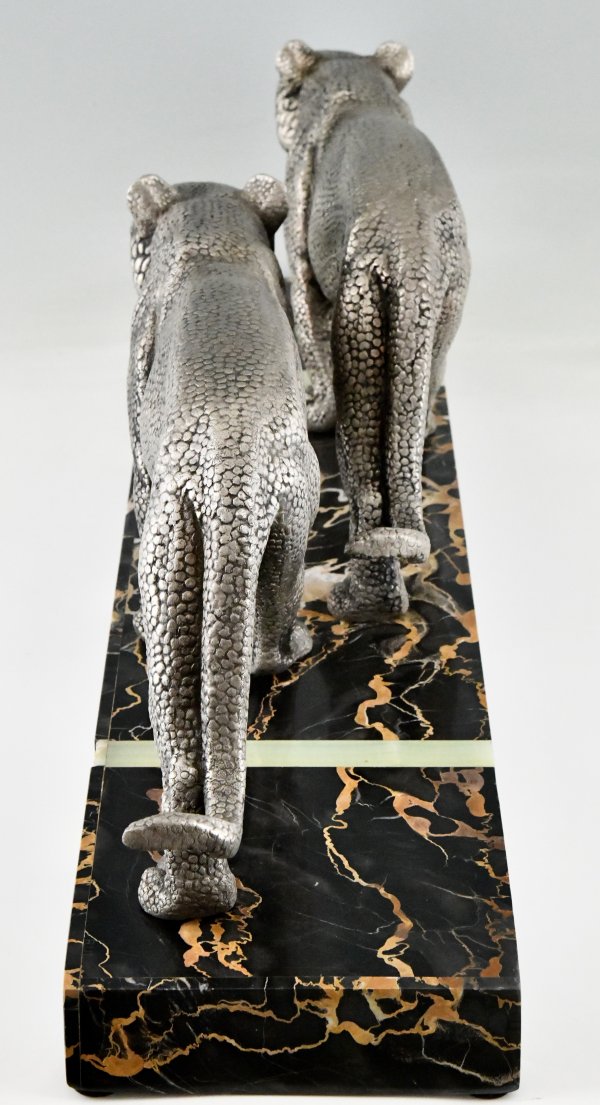 Art Deco sculpture of two panthers.