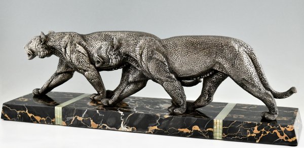 Art Deco sculpture of two panthers.