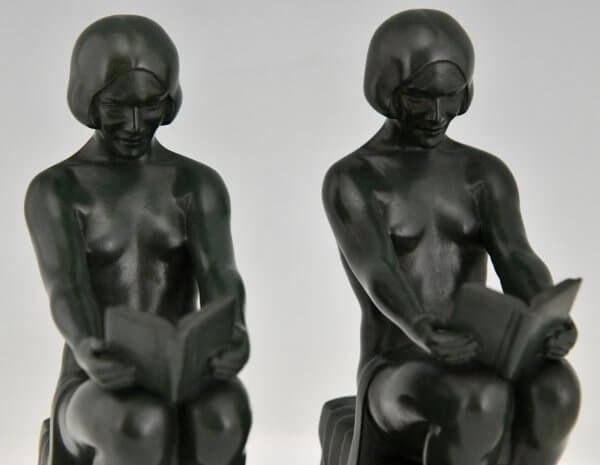 Art Deco bookends with reading nudes Delassement