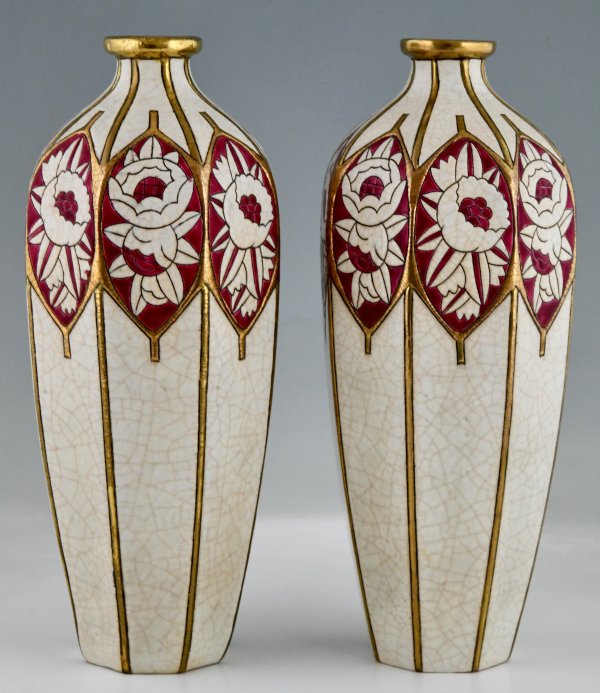 Pair of Art Deco ceramic vases with stylized peonies and rozes.