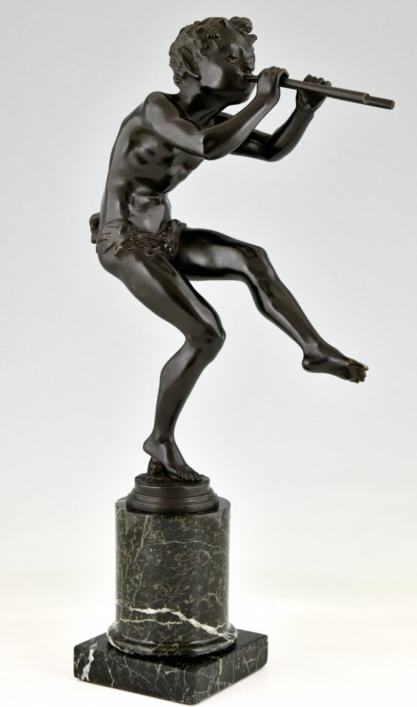 Art Deco bronze sculpture dancing faun with flutes.