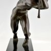 Art Deco bronze sculpture athlete pulling a rope.