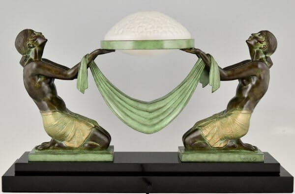 Art Deco style lamp with kneeling nudes holding a glass shade OFFRANDE