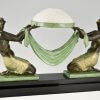 Art Deco style lamp with kneeling nudes holding a glass shade OFFRANDE