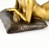 Art Nouveau erotic bronze sculpture reclining nude on a pillow.