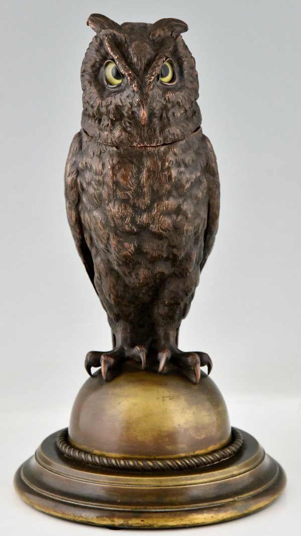 Large antique owl tobacco jar.