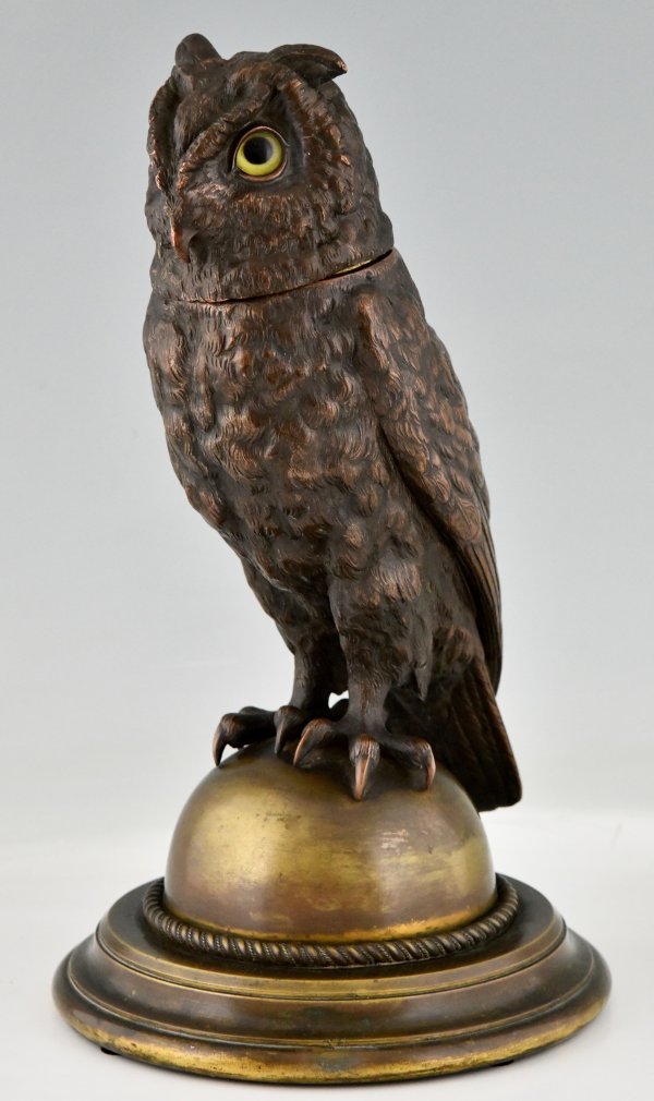 Large antique owl tobacco jar.